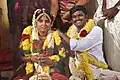 A Tamil Hindu couple during their wedding ceremony.