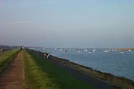 The Wells Harbour mouth from the sea wall; the lifeboat house can be seen in the distance