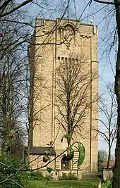 Brick built tower wit wooden door at base