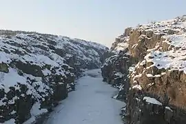 Frozen Drin River and the canyon seen from the bridge in January