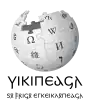 Wikipedia logo showing "Wikipedia: The Free Encyclopedia" in Gothic