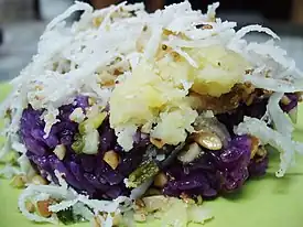 Xôi lá cẩm, sticky rice coloured with magenta leaves and shredded coconut