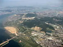 An aerial photo showing Haicang District and adjacent bodies of water and islands