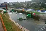 Green plastic bollards, artificial whitewater course, Xiasi, Majiang, Guizhou, China