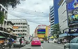 Final stretch of Yaowarat road toward Wang Burapha (the left side is the alley to Saphan Han).