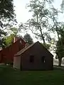 1834 Remick Barn (behind) and Old Schoolhouse (in front)