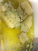 Marinated cassava (Spanish: Yuca en escabeche)